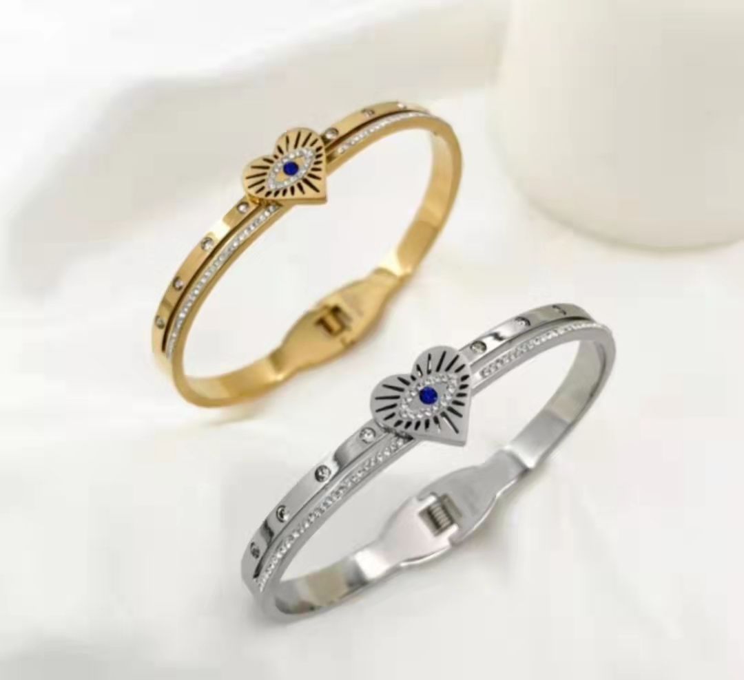 Bracciale rigido Fantasia Occhio-Cuore Oro ed Argento